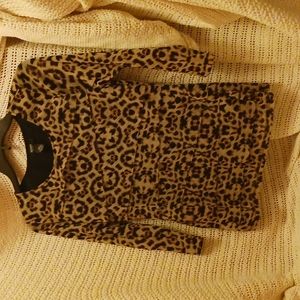 It is in 3/4 length sleeve about Albany petite medium nice nylon lining is soft